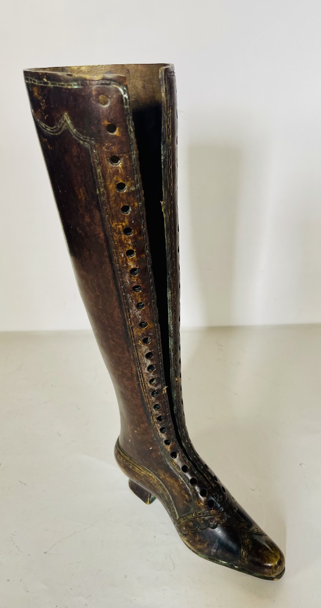 Botte en bronze - Enseigne de magasin-photo-1